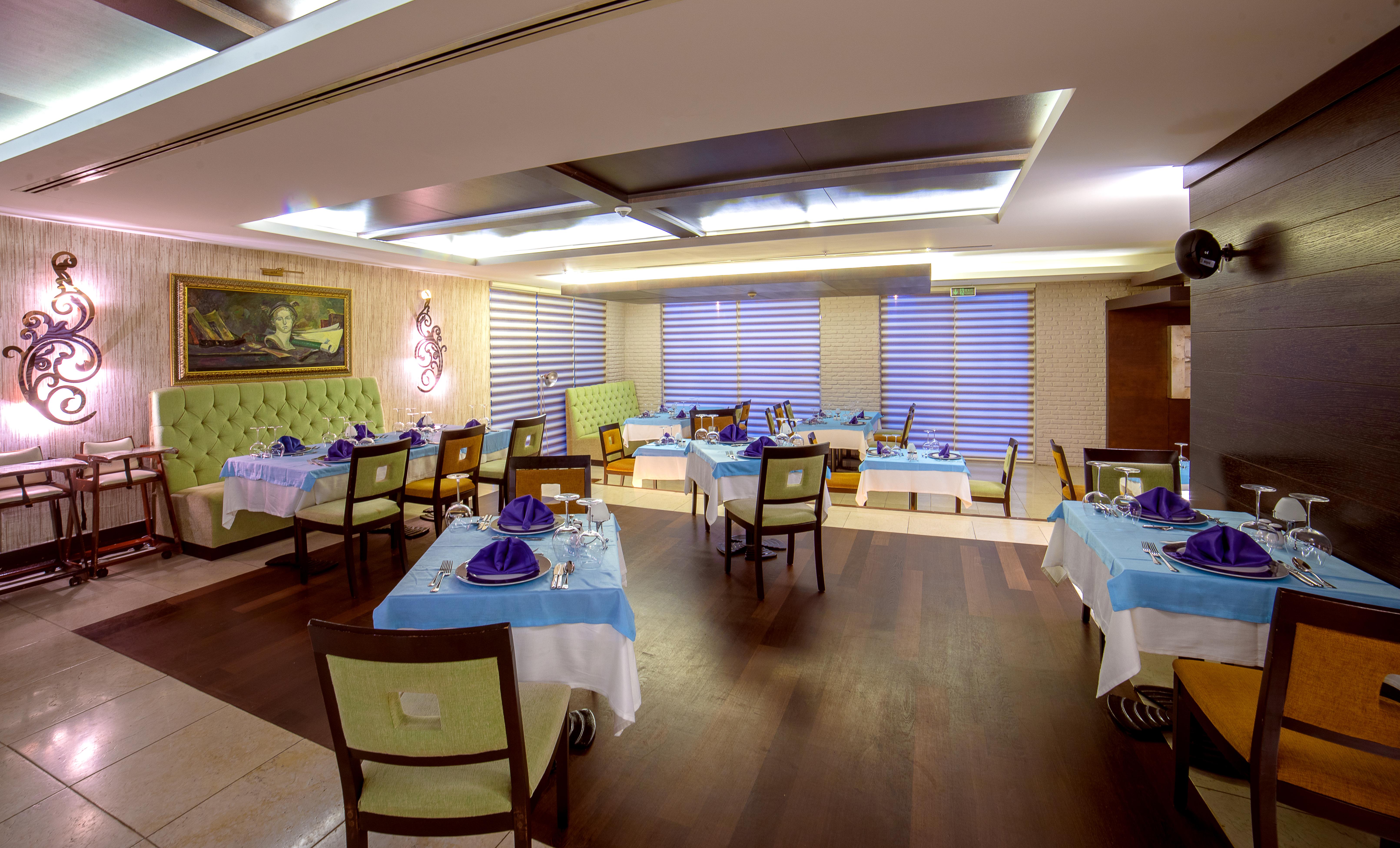 Porto Bello Hotel Resort & Spa Antalya Exterior photo The interior of a restaurant in India