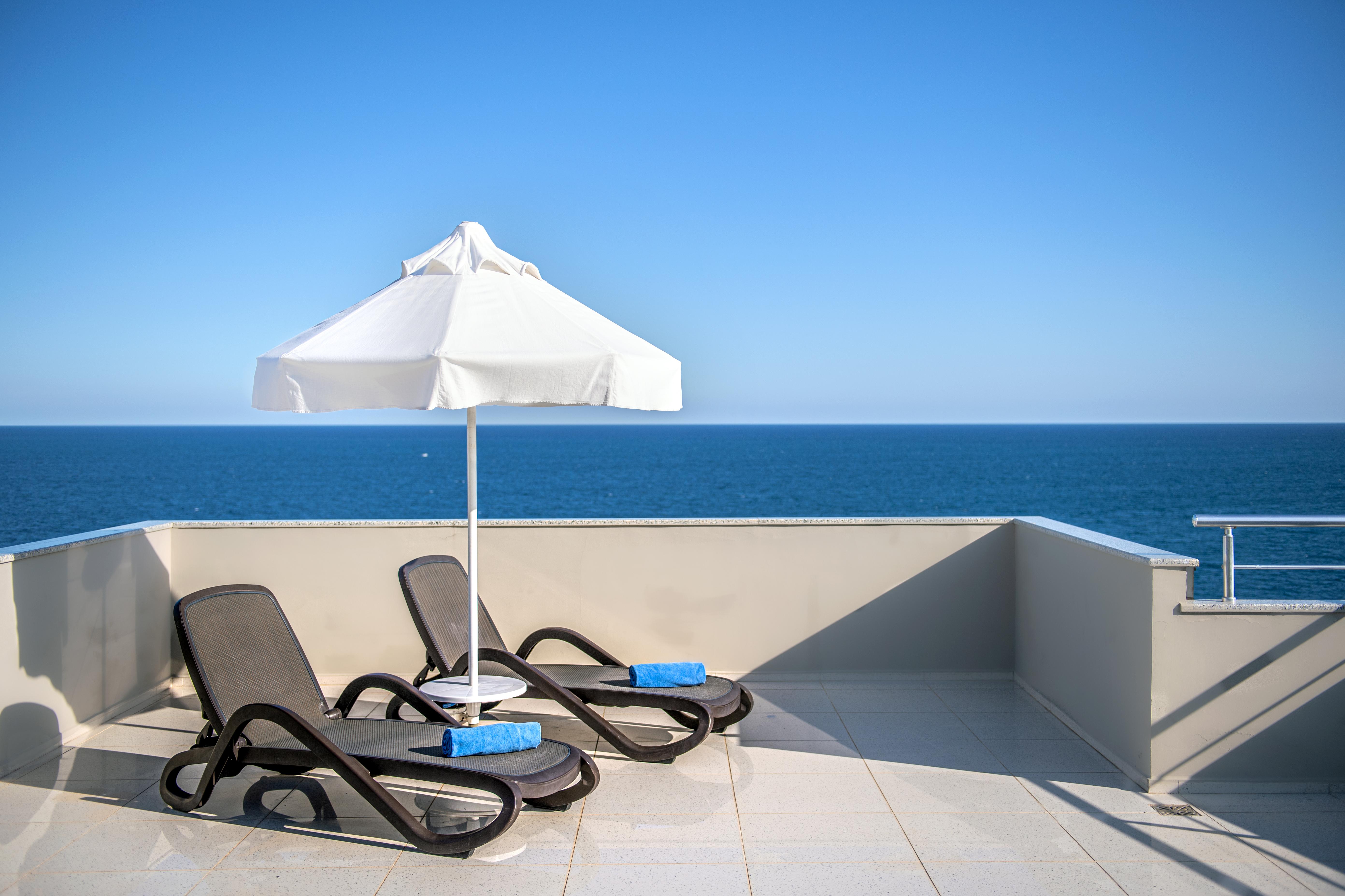 Porto Bello Hotel Resort & Spa Antalya Exterior photo A patio umbrella