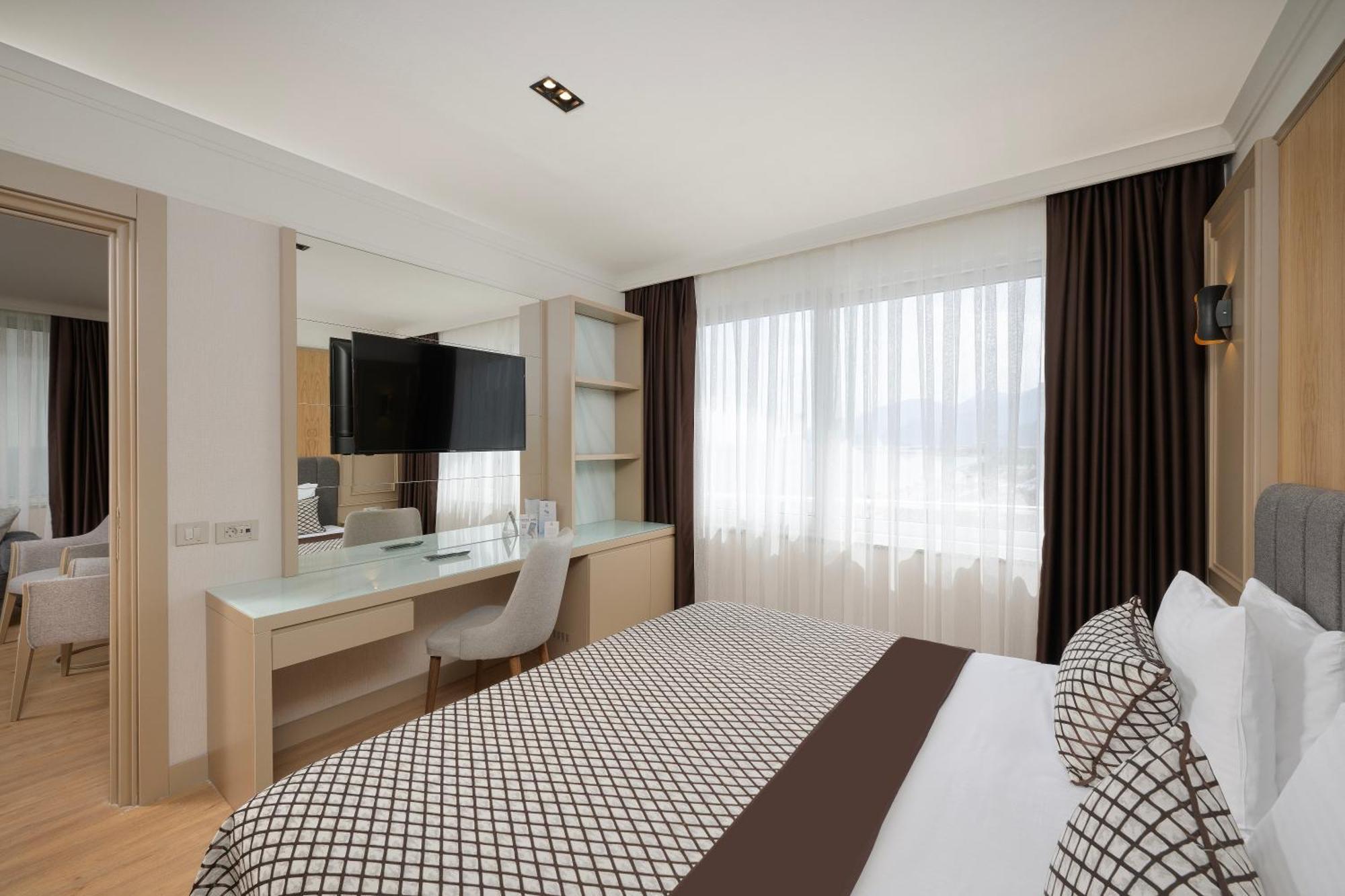 Porto Bello Hotel Resort & Spa Antalya Room photo A bedroom in a hotel
