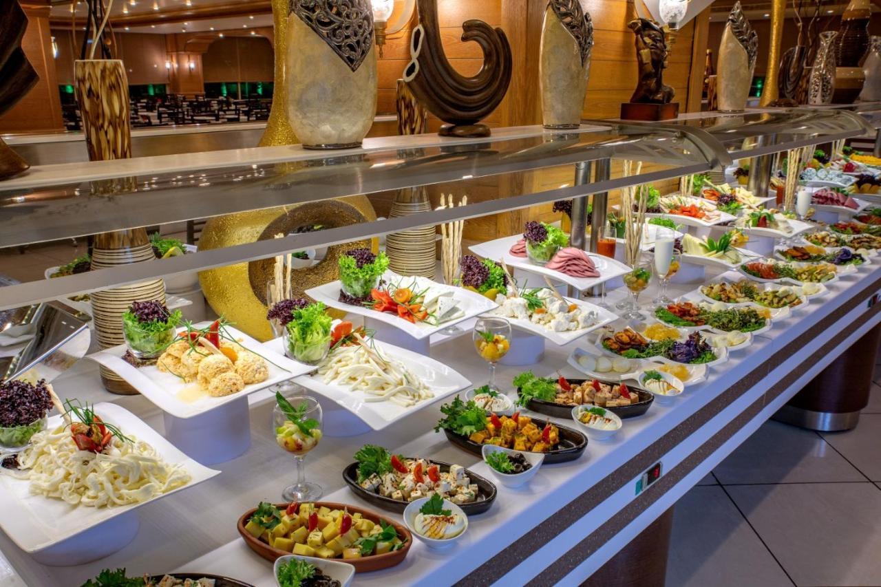 Porto Bello Hotel Resort & Spa Antalya Exterior photo A buffet at a hotel
